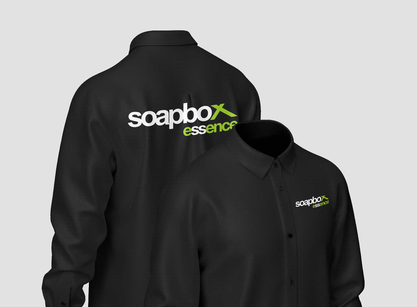 Soapbox Essence branded black corporate shirts showing the front and back of the embroidered logo